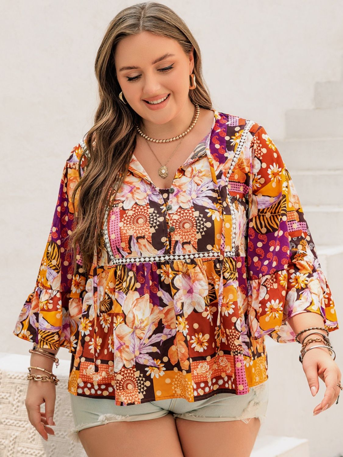 Plus Size Printed Tie Neck Blouse -