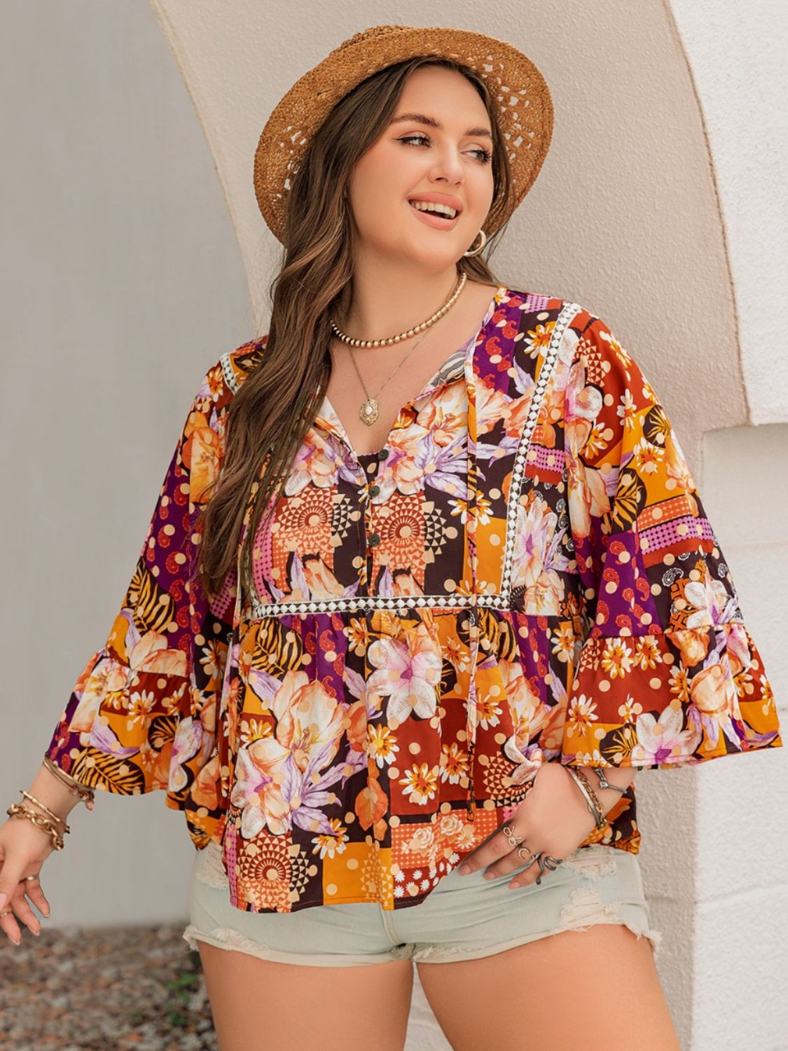 Plus Size Printed Tie Neck Blouse -
