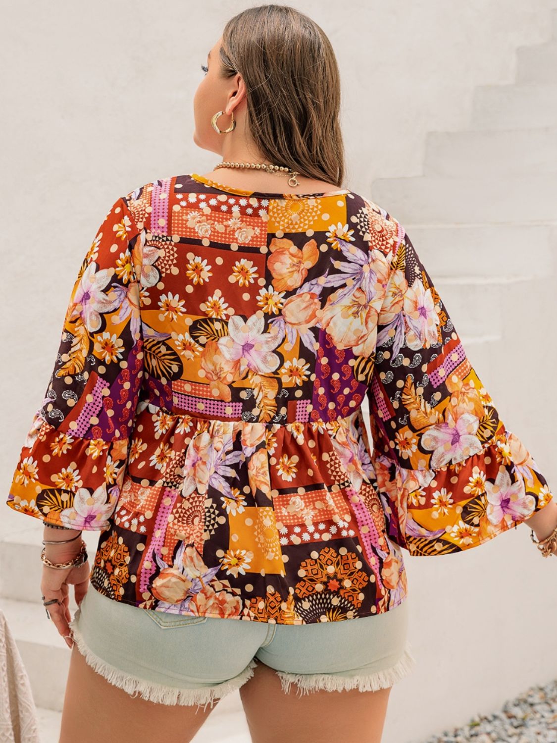 Plus Size Printed Tie Neck Blouse -