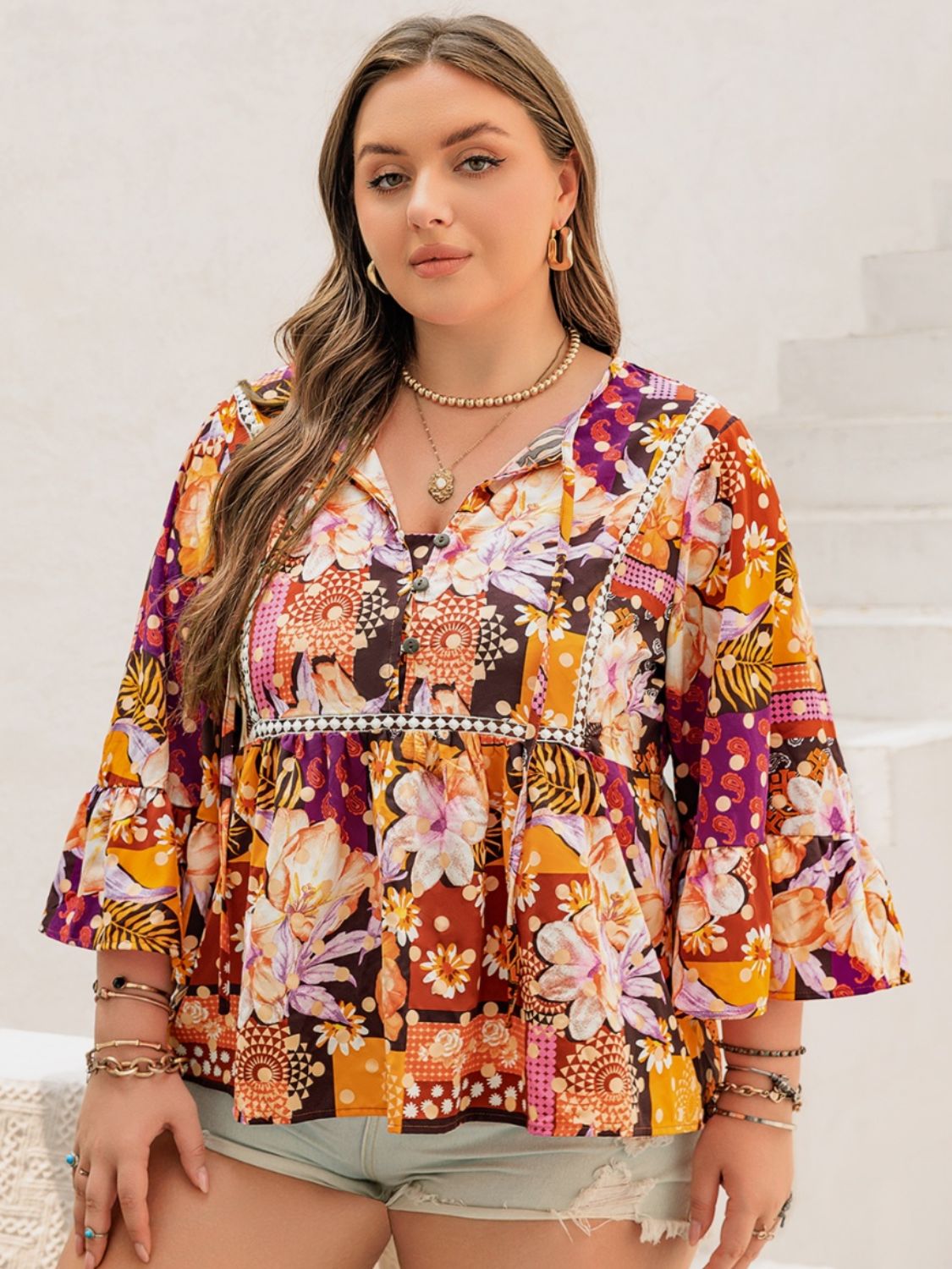 Plus Size Printed Tie Neck Blouse -